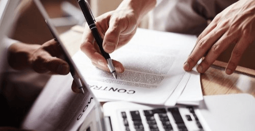 pen-over-contract-P39RBNS-1-2